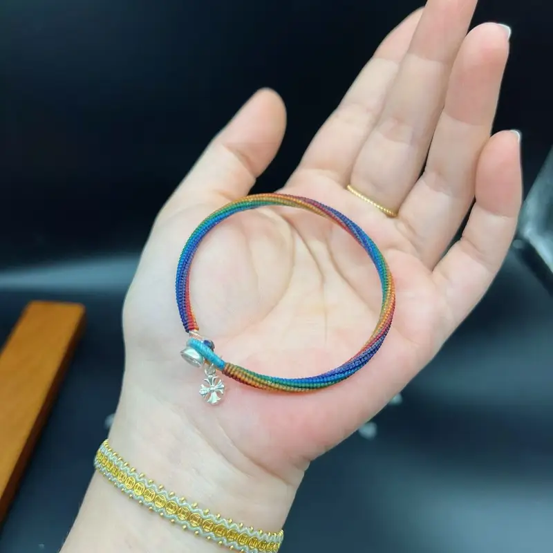 Seven-Light Ballad · Rainbow Bracelet Seven lights rest on your wrist, whispering a ballad of peace. – Makrome modeli, @Danjewel